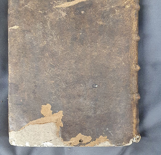 The damaged binding covering Bolton_D.17.26