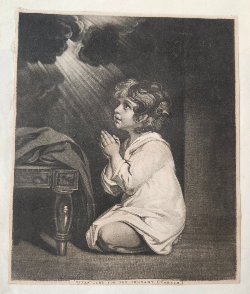 Image of child praying in black and white